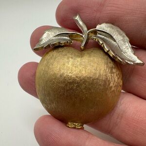 Vintage fruit (apple?) brooch, EUC. Brushed gold with silver leaves.